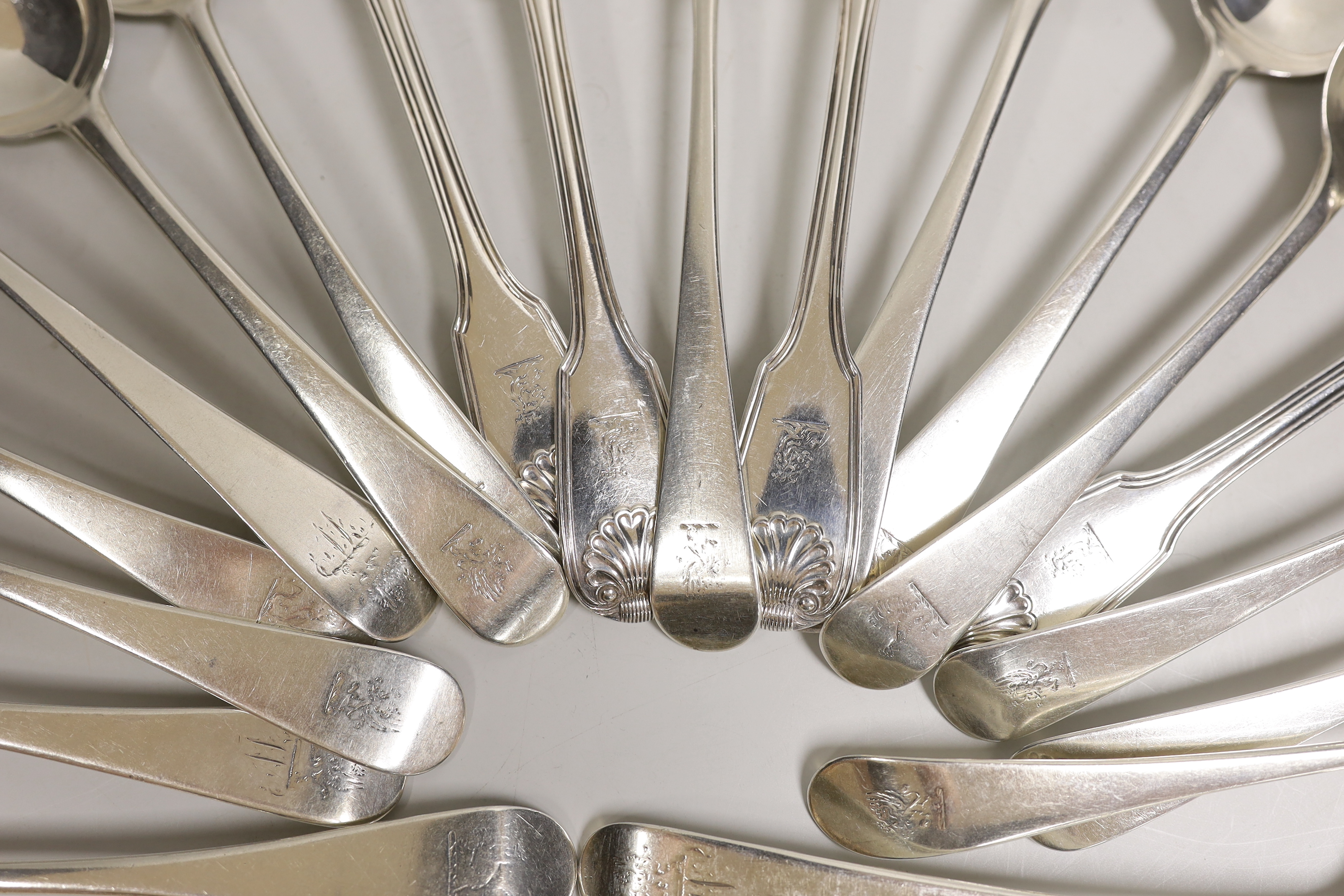 A group of assorted 19th century silver table spoons including four George III Old English pattern, London, 1808, various patterns, dates and makers, 42.5oz.